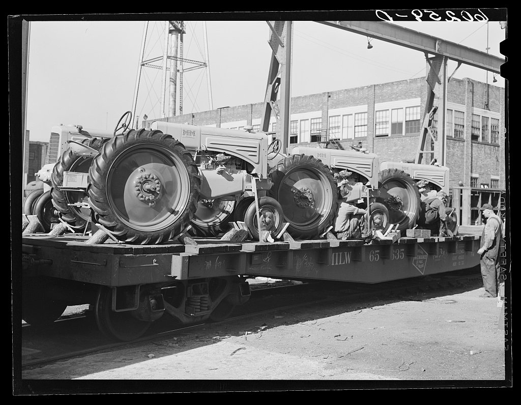Minneapolis-Moline tractors loaded for rail shipment, 1939